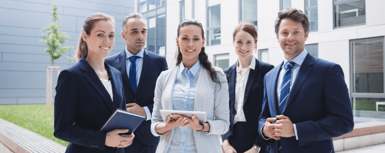 businesspeople-standing-outside-office-building-2.png